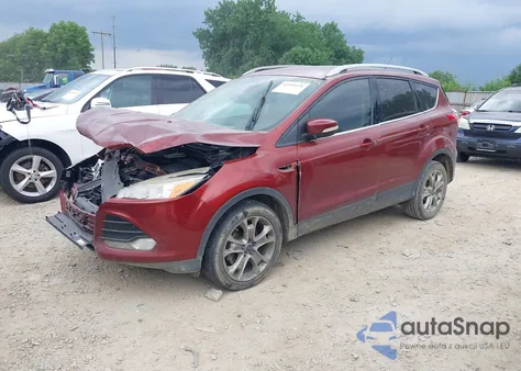 2014 Ford Escape Titanium z USA, uszkodzony, nr VIN 1FMCU0JX1EUB33892